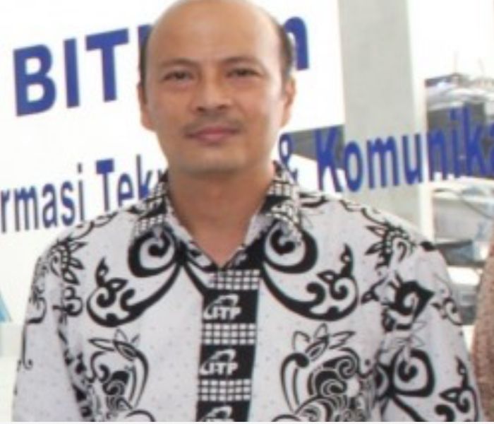Indra Warman, M.Kom